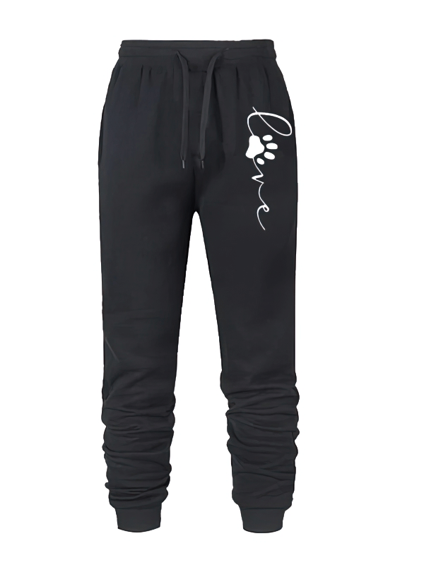Sporty women's jogger pants with cat's paw print, SF1872. Durable polyester, slight stretch, perfect for casual wear. Wardrobe staple.